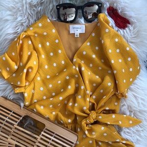 Yellow polka dot romper